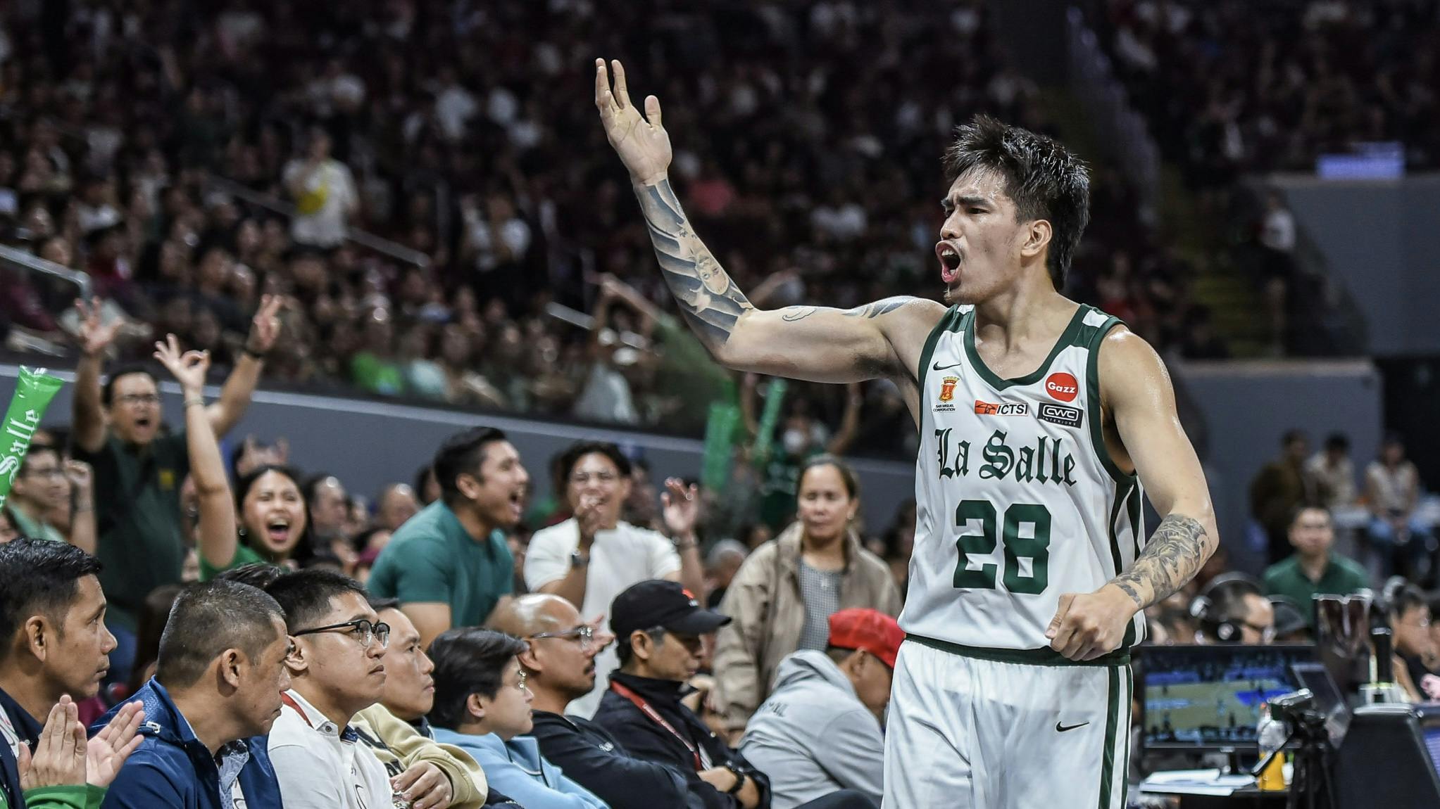 Green Archers happy to have ‘weathered the storm’ against Fighting Maroons in rivalry match